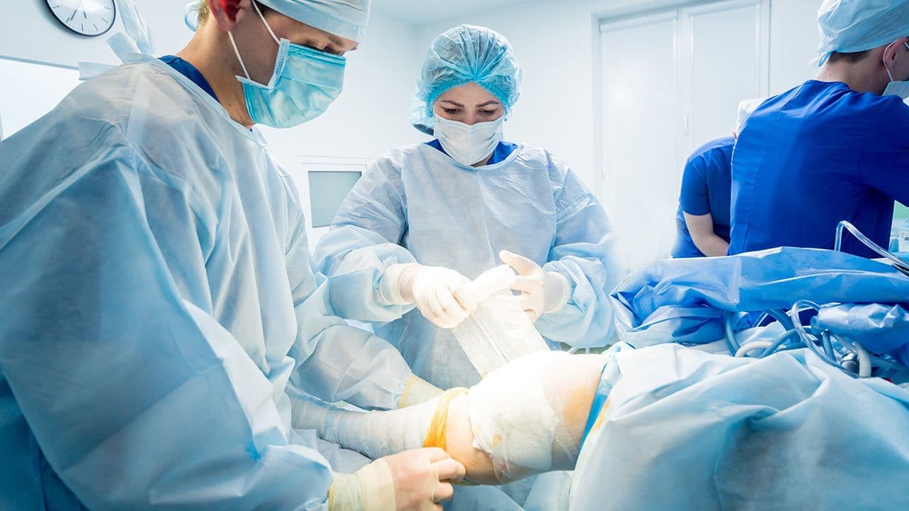 Emergency orthopaedic team treating trauma patient