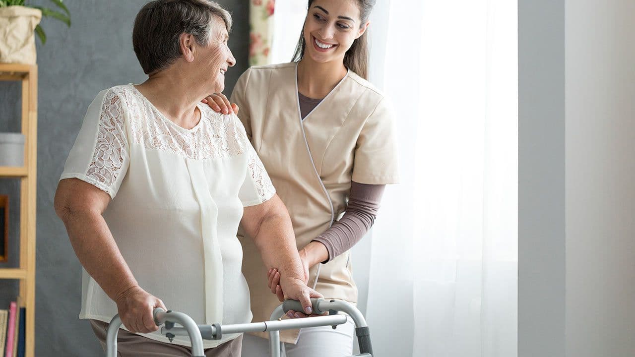 Surgeon planning hip joint replacement on digital tablet